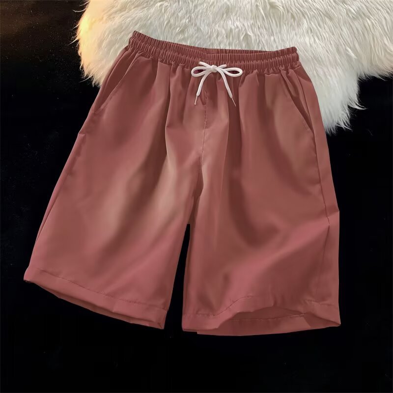 Personalizado al por mayor caramelo de viento neutro multicolor 25 colores primavera y verano nuevos pantalones cortos casuales de cinco puntos sueltos y cómodos