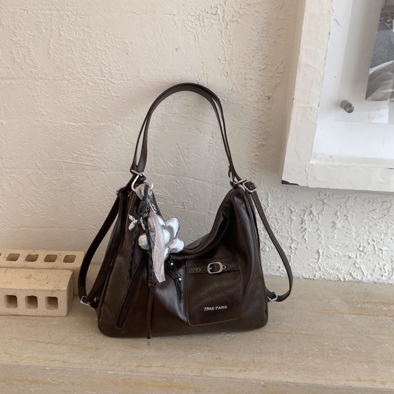 Bolsas de tendencia transfronteriza de gran capacidad para mujeres 2026 nueva moda coreana multipropósito mochila de viaje ocio bolsa de mano image 11
