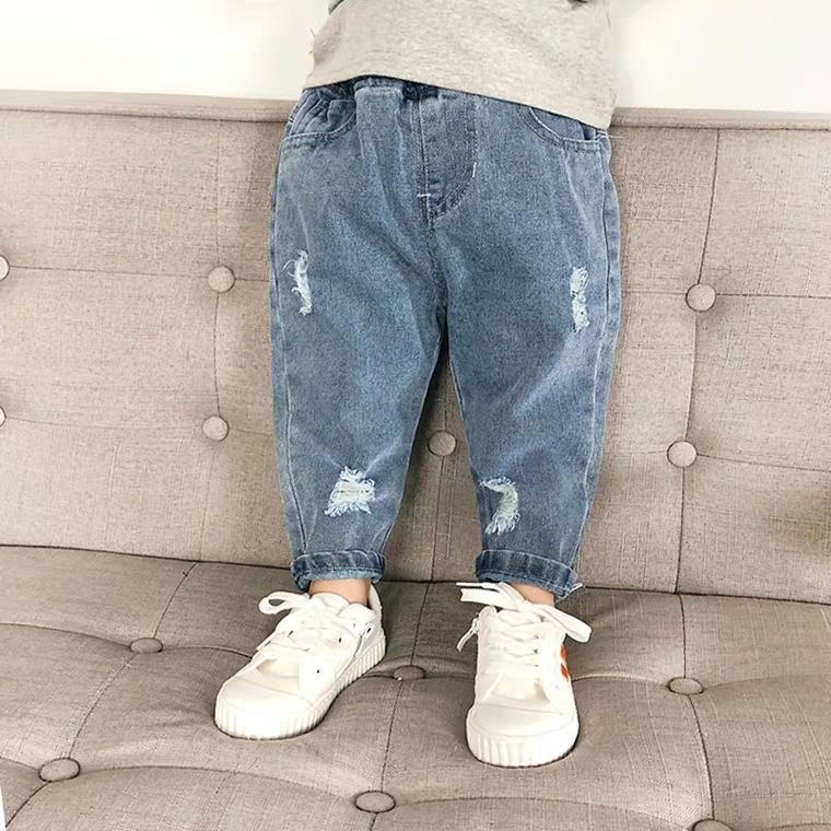 子供服の子供の穴が開いているジーパンの春と秋の新型の1-8歳の女性の男の子のゆったりしているズボンの赤ちゃんの洋気のお父さんのズボン|undefined
