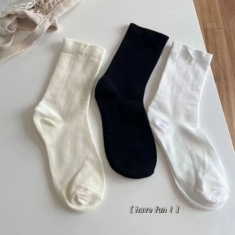 Solid color pile up socks are comfortable and minimalist. Versatile and versatile, solid color white socks are breathable and slim for couples. Medium tube socks factory