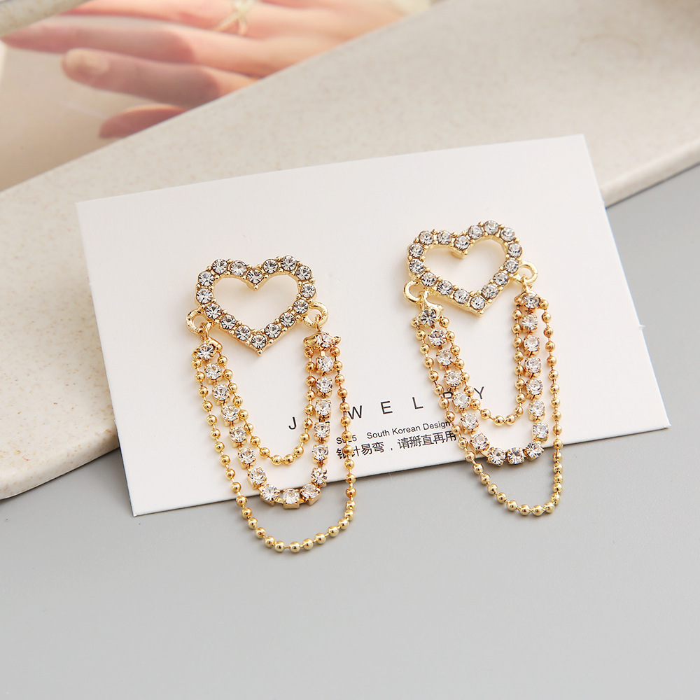 Shiny Heart Shape Alloy Hollow Out Rhinestones Earrings display picture 4