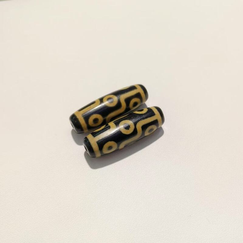 メーカー歯黄包糊九眼12 × 38mm天珠歯黄風化古法包糊瑪瑙天珠【a級】|undefined