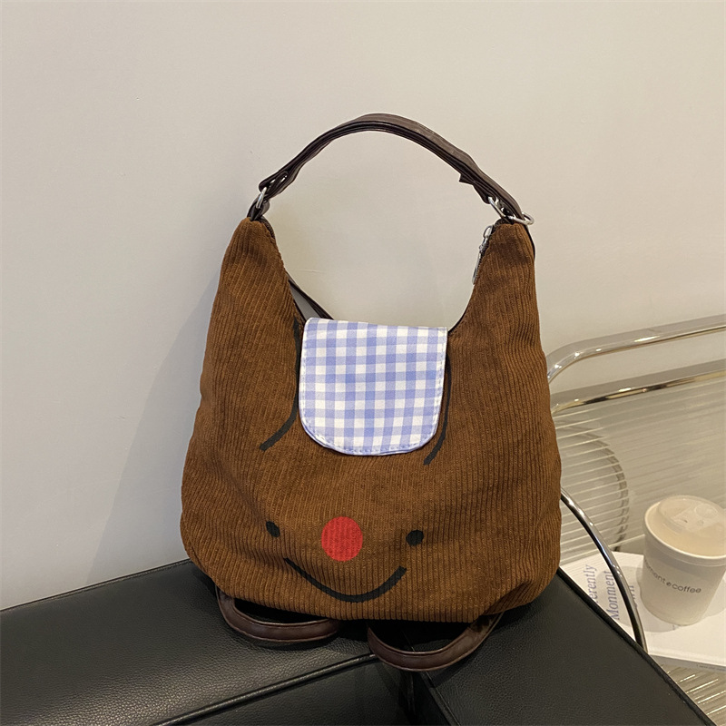 Vintage velcro nariz roja sonriente bolso de mano para mujeres otoño y invierno 2024 gran capacidad mochila de viaje mochila