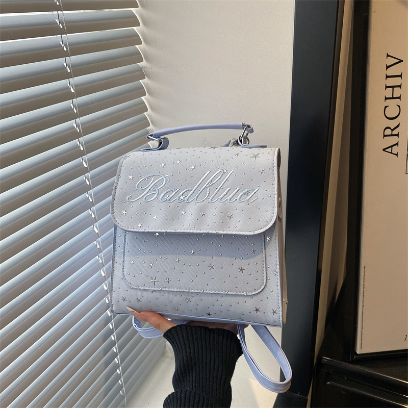 Mochila de moda coreana 2026 nuevo estilo coreano estilo académico letras versátiles bolso de hombro de mano