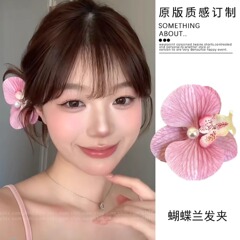 春夏の胡蝶蘭の花の真珠のヘアピンの女性の高級な甘いサイドの前髪は花のデザイン感をシミュレーションします。