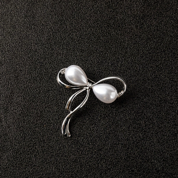 With bow, silver