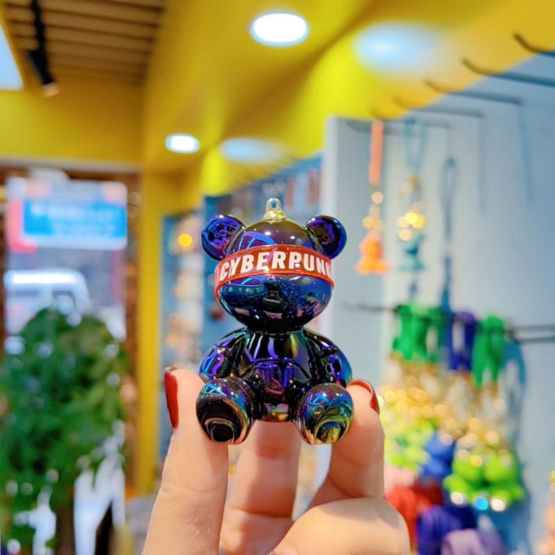 Resina de dibujos animados colorido gradiente oso llavero creativo postura sentada red oso llavero de moda colgante de llave de automóvil