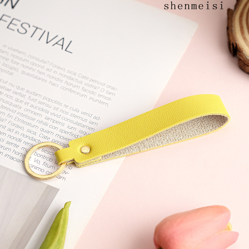 Keychain de cuero pu transfronterizo estilo simple de mano hebilla de cuero logotipo imprimible colgante de cuero llavero para hombres y mujeres