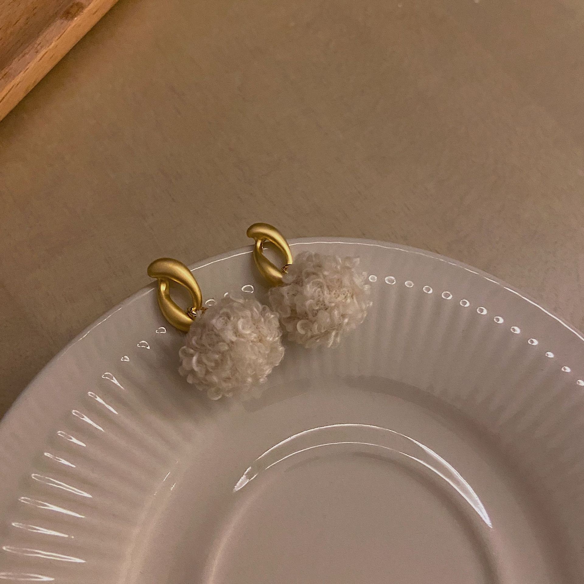 Korean fashion lamb wool plush ball earrings new niche geometric all match silver needle earrings trend_voghion.com
