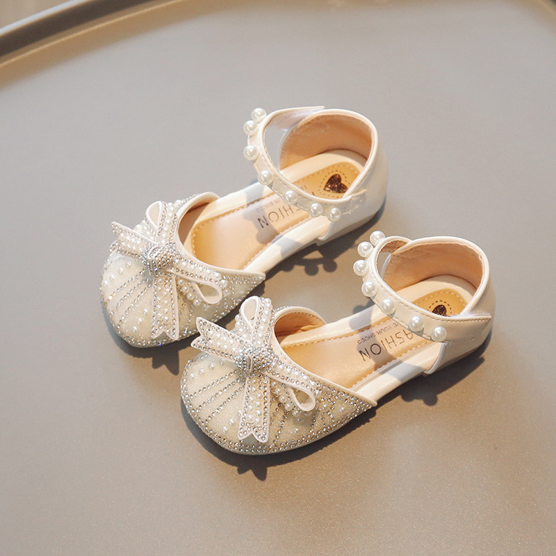Zapatos de cristal para niñas 2026 verano nuevas sandalias de cabeza de bolsillo para niños pequeños zapatos de princesa suaves zapatos de baile de niñas