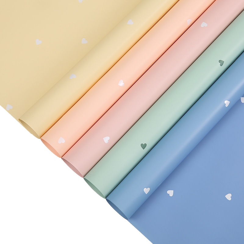 Venta directa de fábrica de papel de regalo impermeable con estampado de flores de la serie Corazón de Durazno de Amor Cálido de Cynthia, exclusivo para el mercado internacional.
