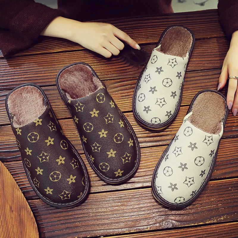 Кожаное лицо хлопчатобумажные тапочки для мужчин 2024 новый зимний толстой подошвенный дом водонепроницаемый бытовые нескользкие тапочки женские осень-зима