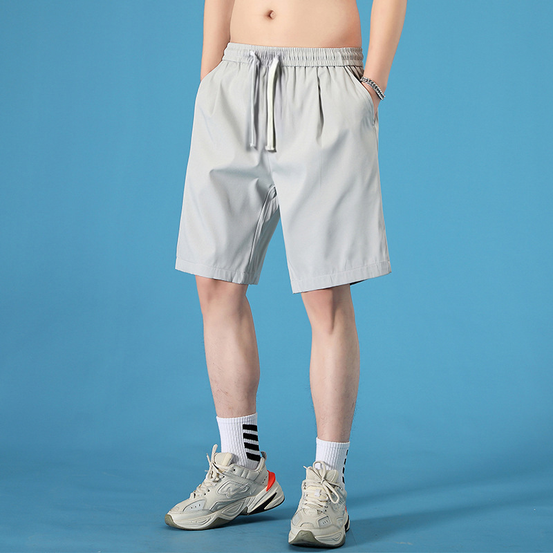 シャツの少ない服装の男性の半ズボンの夏の薄いタイプの大きいサイズのカジュアルなビーチのズボンの運動の氷の糸のゆったりしているカジュアルな5分のズボン|undefined