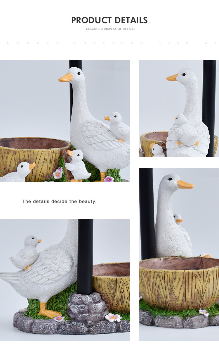 Ankka puutarhapatsas aurinkokennovalolla hartsikoriste_voghion.com