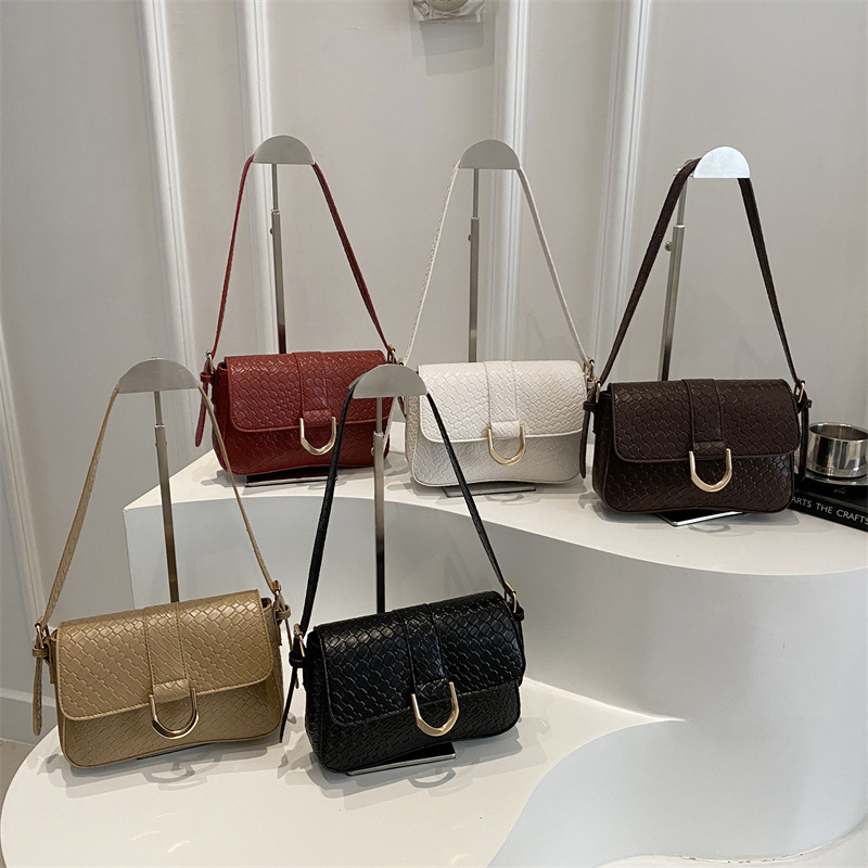 Bolsa de brazo de mujer trenzada retro 2025 primavera nueva bolsa de brazo en el temperamento bolso pequeño bolso cuadrado bolso mujer