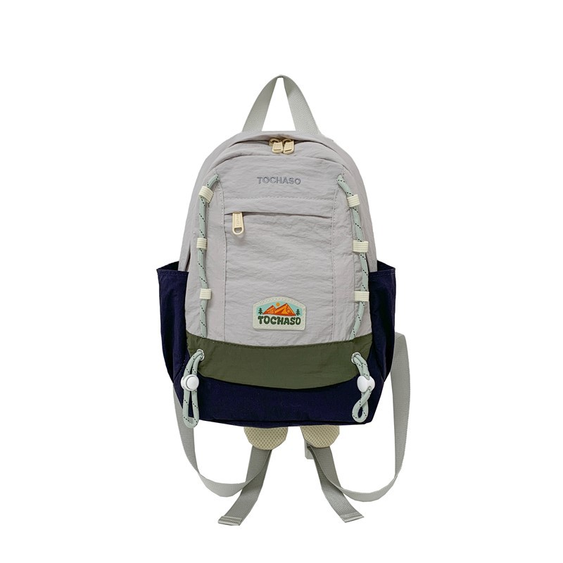 Mochila de moda coreana para niños y niñas, mochila de alta capacidad para estudiantes de escuela primaria, nueva mochila para niños con cuerda extranjera.
