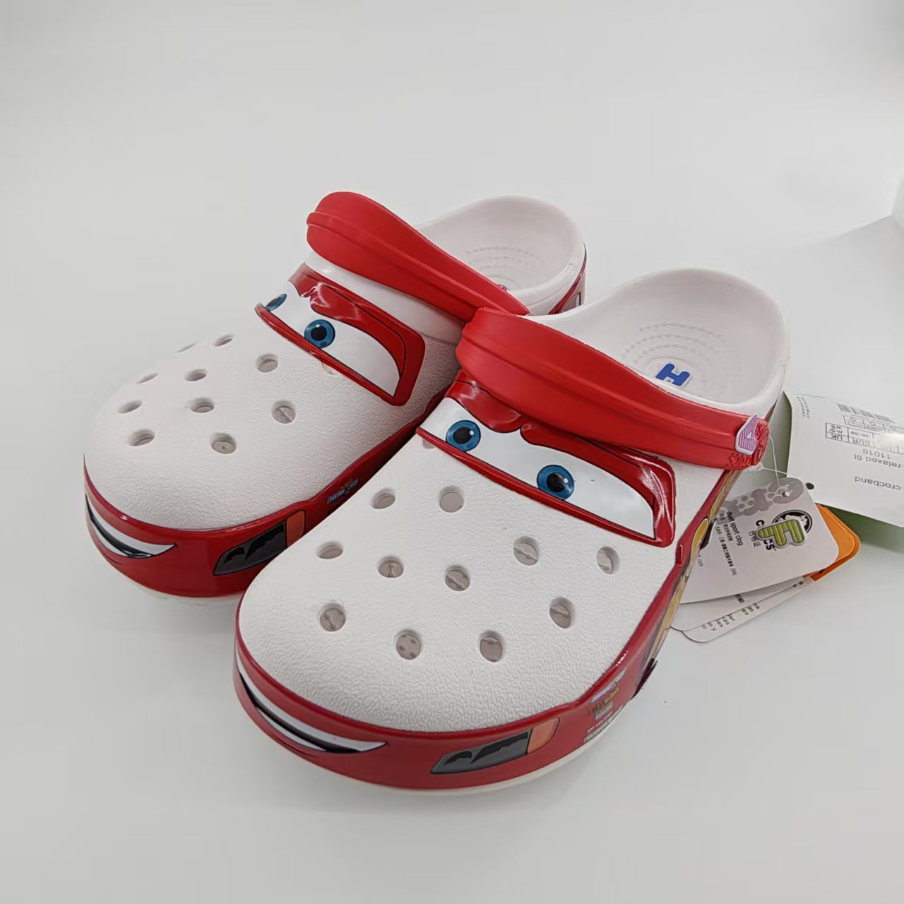 Spot 95 automóviles sin agujeros de lámpara zapatos de carreras movilización total zapatos para hombres y mujeres 2025 sandálias de playa spot al por mayor