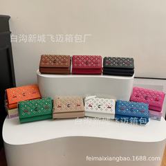 外贸女包2025新款个性设计感斜挎包PU百搭都市简约PU质感小方包批