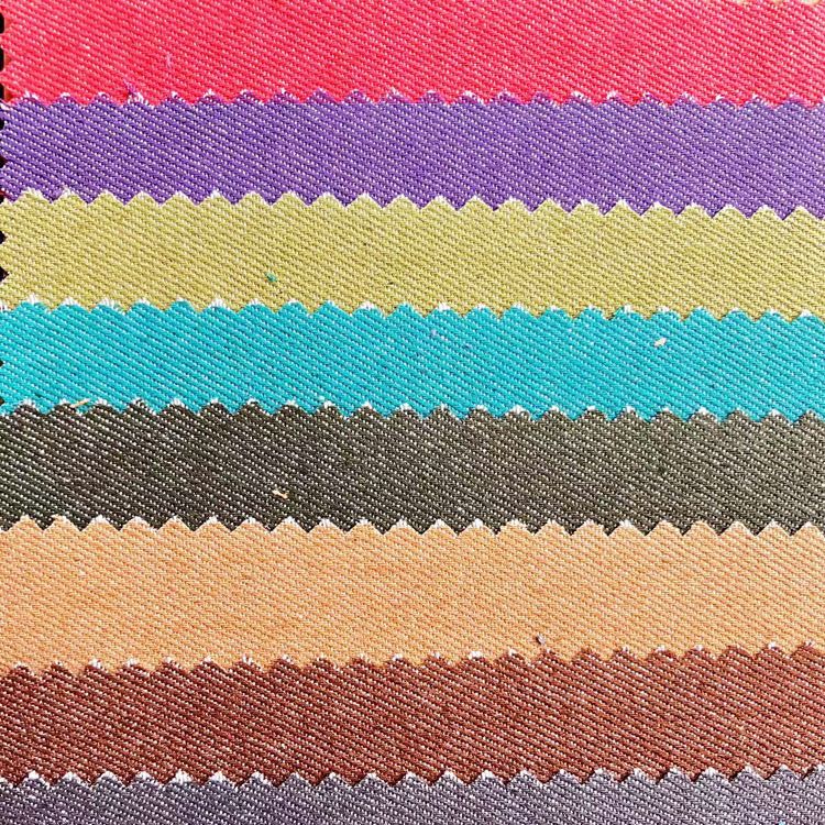 供应全棉斜纹咖啡色丝光牛仔布面料水洗弹力牛仔服装扎染裤子