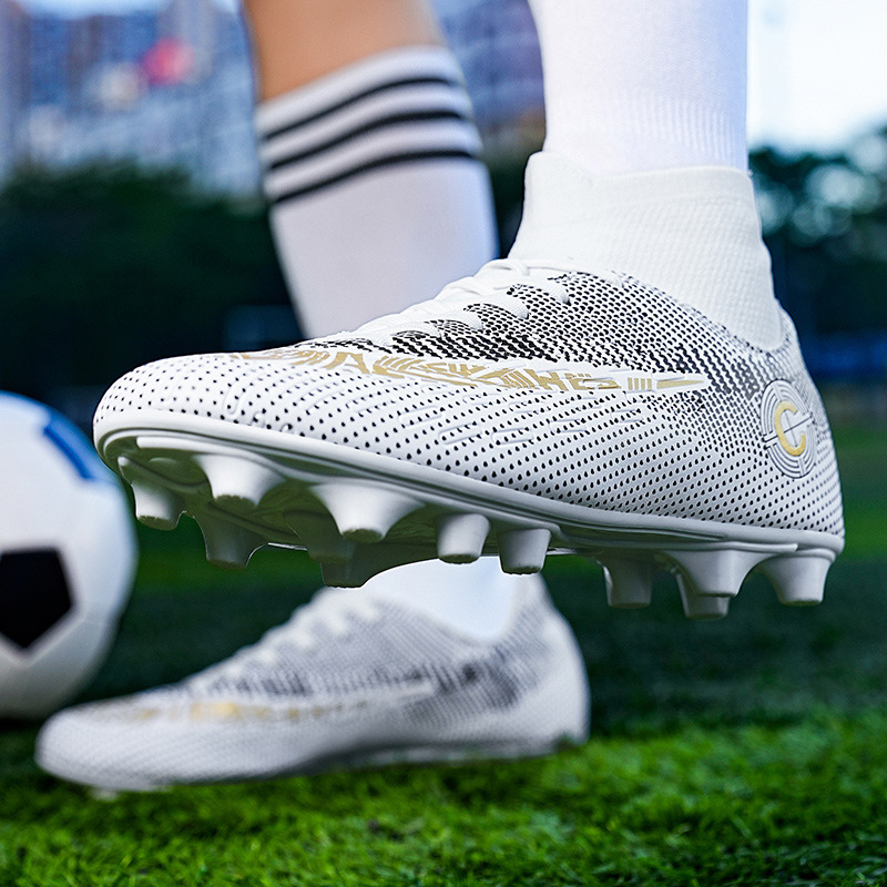 Zapatos de fútbol al por mayor de tamaño grande de alto impacto para niños zapatos de clavos de cuero pegamento de clavos largos zapatos deportivos adolescentes de tamaño grande