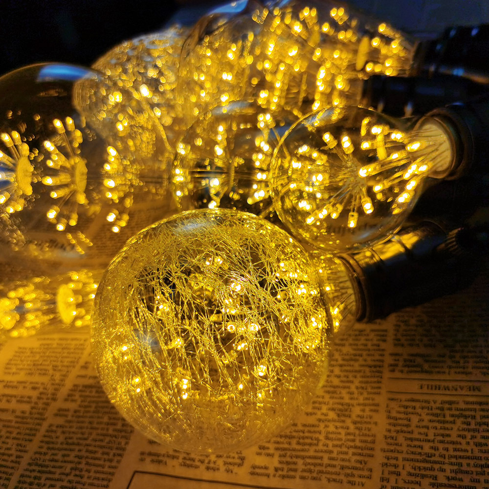 Bombilla de Edison transfronteriza estrellado luz LED E27 tornillo iluminación retro luz cálida bombilla roja neta