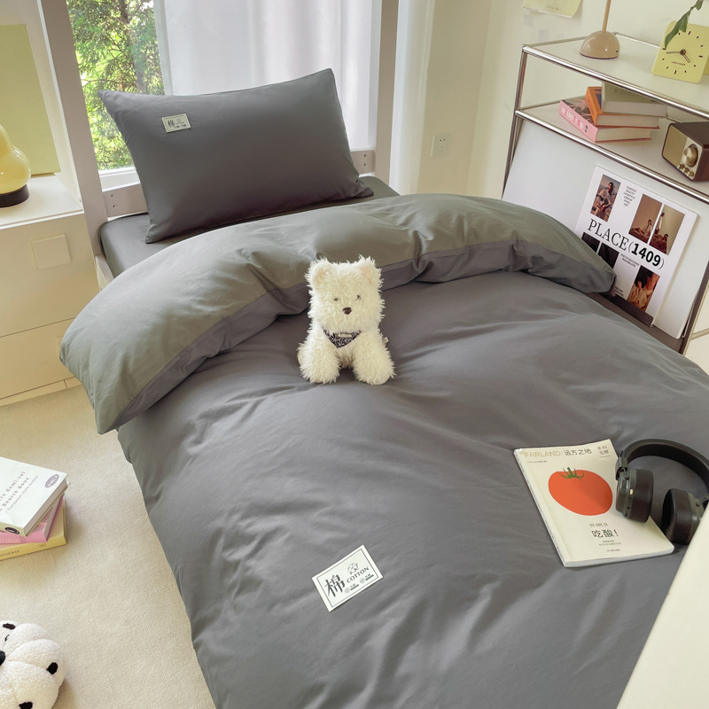 Temporada de apertura cama de dormitorio de estudiantes de color sólido de tres piezas de algodón puro 2025 nuevo estilo sábana cubierta de edredón sábana