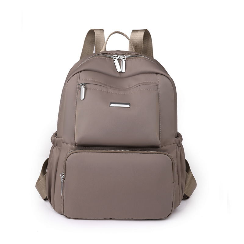 2023 nueva mochila de tela Oxford para mujer casual, color sólido simple, gran capacidad, mochila plegable ligera, mochila escolar de moda