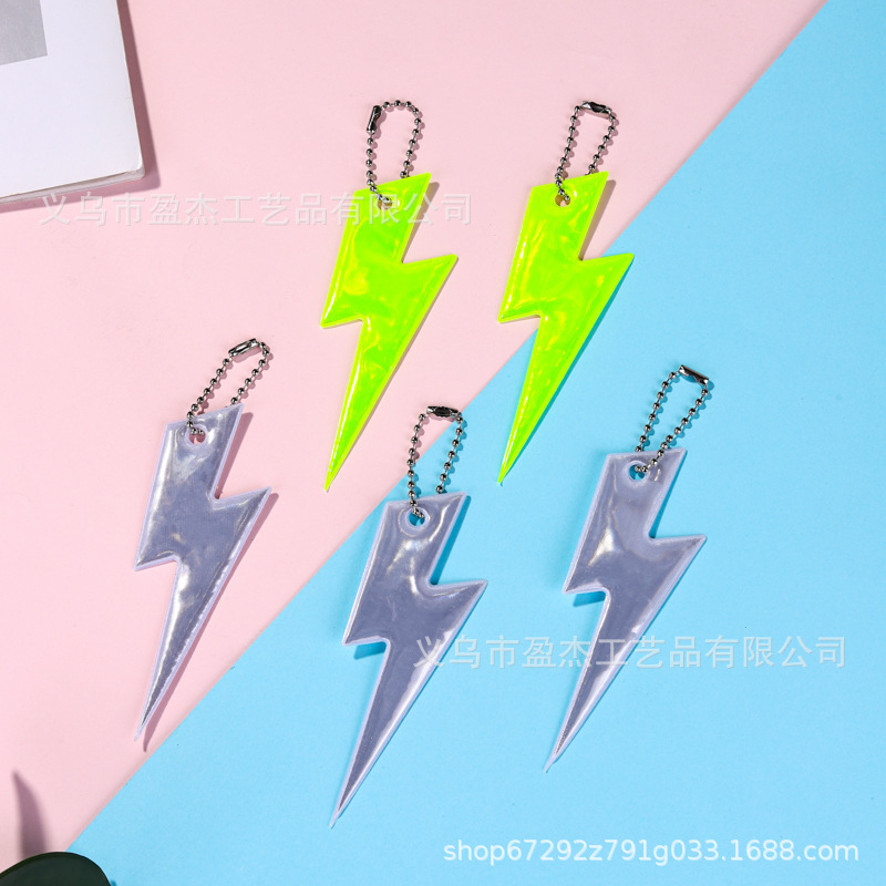 Colgante reflectante Gráficos de relámpago de doble cara Reflex Keychain PVC Night Riding Safety Advertency Colgante Mochila