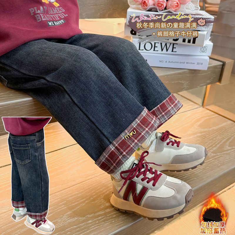 Nuevos pantalones de niñas de otoño y invierno pantalones de jeans de cuadros rojos para niños de invierno extranjero con pantalones de piernas anchas para bebés calientes