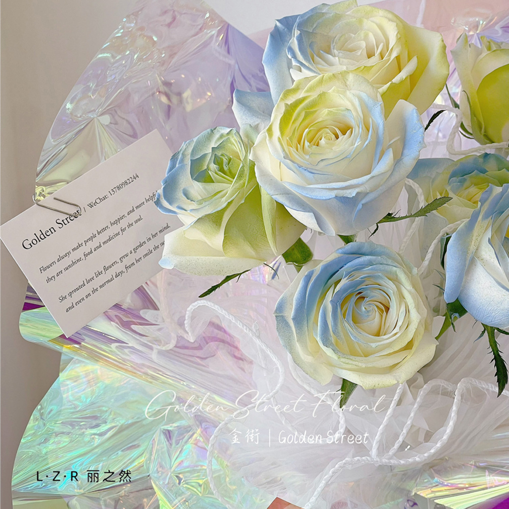 Papel de embalaje de flores Película de fantasía Película de arco iris celofán Papel de gelatina Impermeable Laser Floristería Papel de embalaje de ramo