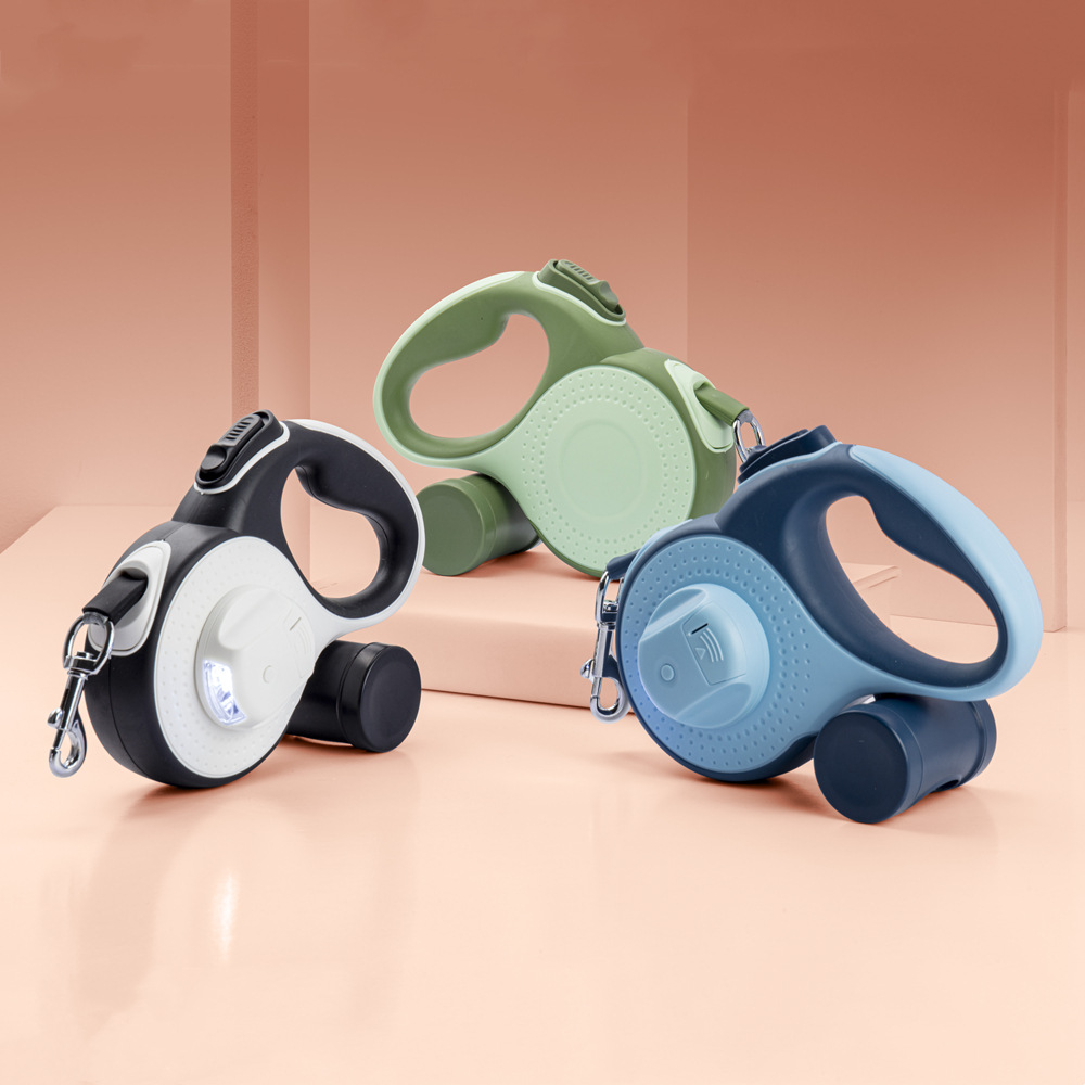 Laisse rétractable automatique pour chien de 5 m avec distributeur de sacs poubelles. Également disponible en 8 m._voghion.com