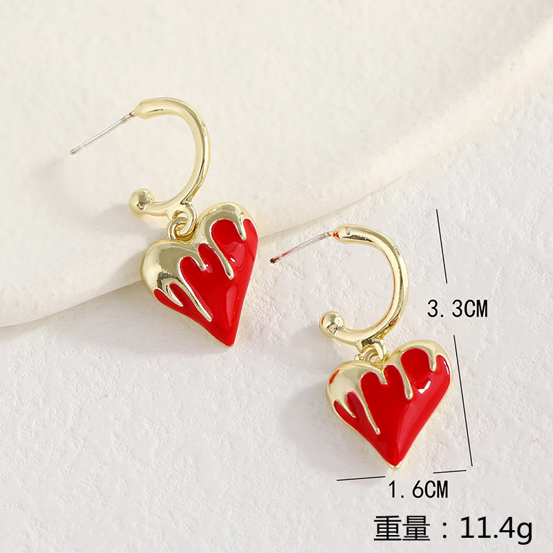 Retro Metal Earrings Japanese And Korean Fashion New Alloy Dripping Love Earrings display picture 1