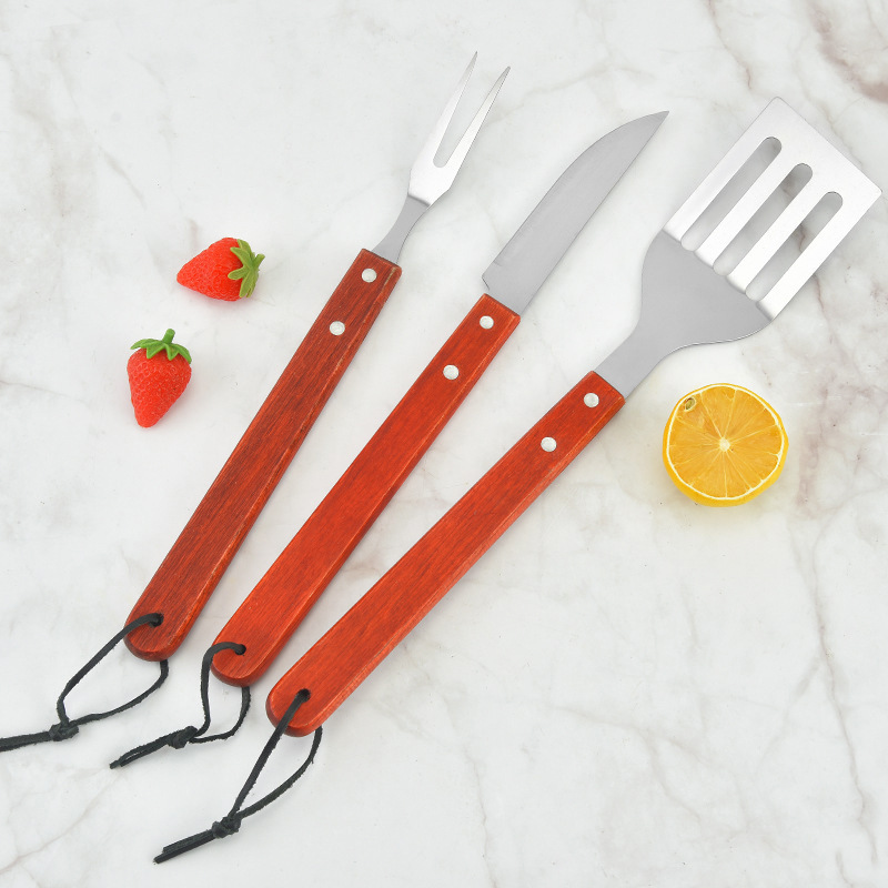 Ventas directas de mano de madera BBQ BBQ conjunto de parrilla clips de parrilla tenedor cuchilla delantal Oxford bolsa de tela parrilla set de cinco piezas
