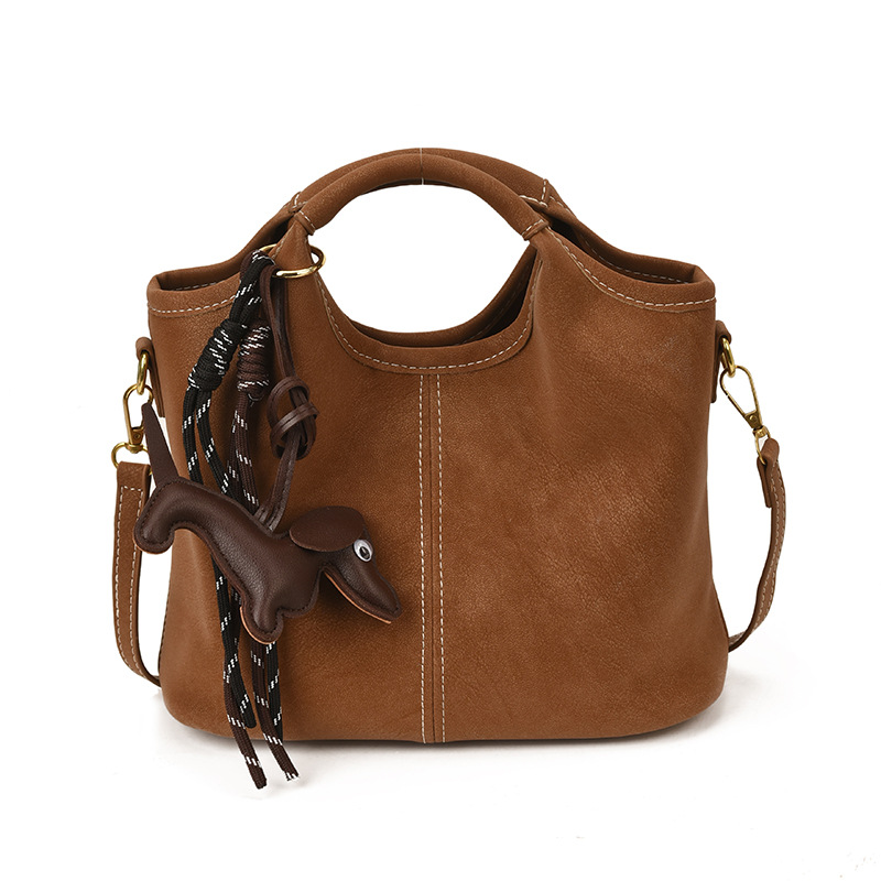 Transfronterizos viajeros bolsas de mano retro mate bolsas de balde de mano mujeres otoño e invierno 2025 nuevo mochila de hombro