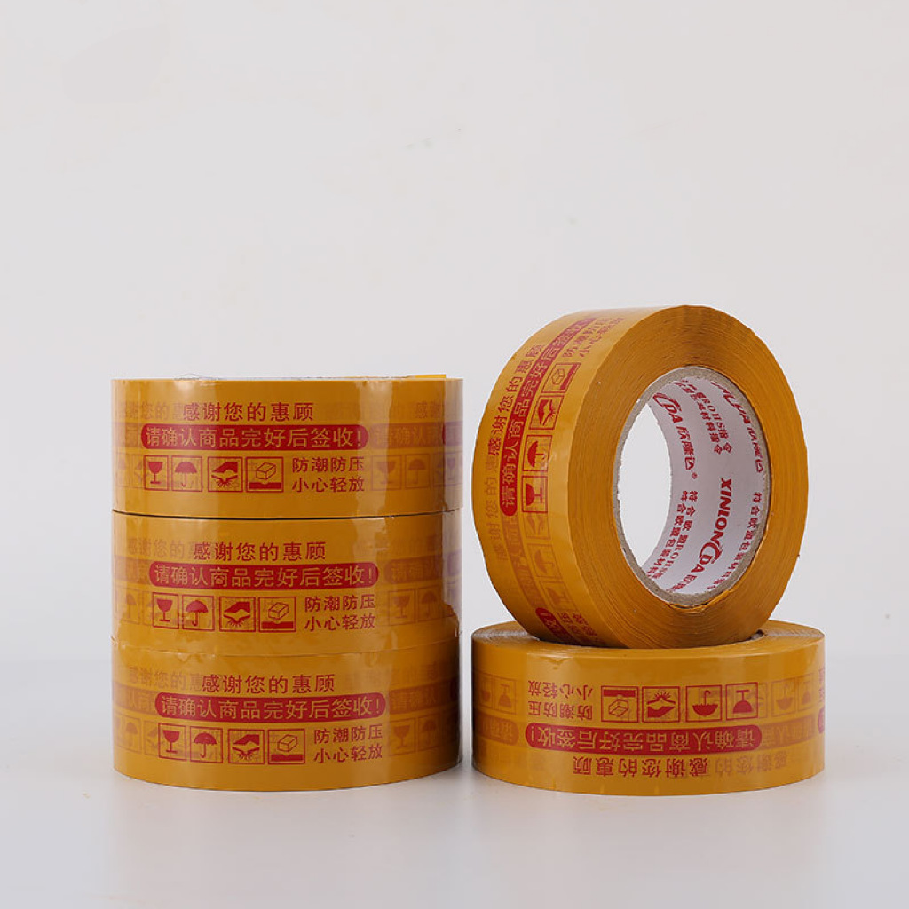 Cinta transparente de alta viscosidad para sellar cajas, cinta de embalaje, cinta de sellado para envíos exprés de comercio electrónico, cinta amarilla, venta al por mayor por caja, personalizable.