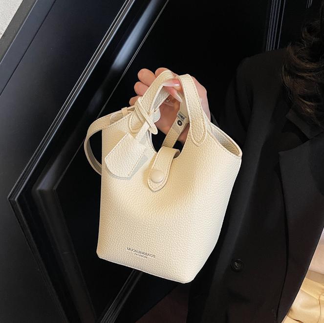 Bolso de canasta de verduras súper caliente transfronterizo femenino 2025 nuevo bolso de cubo de ocio simple moda bolso de hombro de todo fósforo