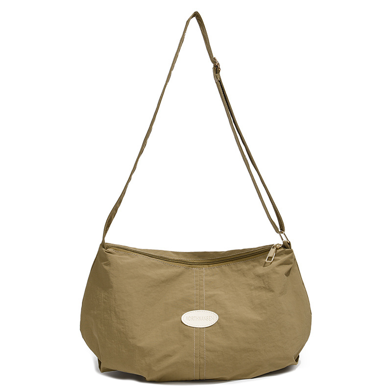 Bolso de color sólido universal 2025, nuevo bolso de bolsas de bolsas de bolsas de moda de hombro, mochila de viaje casual para hombres y mujeres.