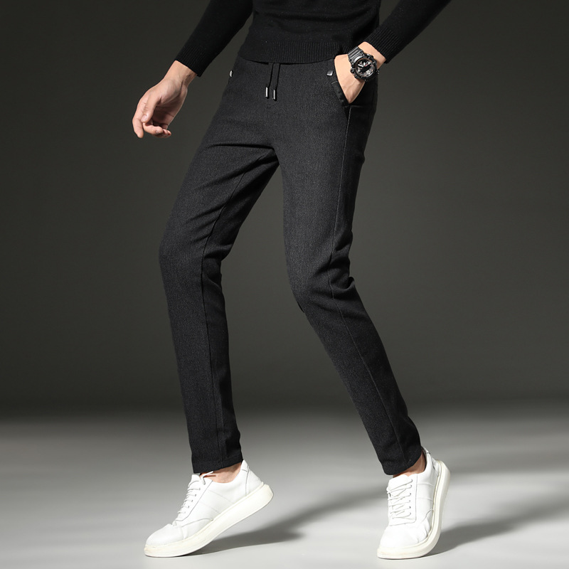 Cordón pequeño recto de primavera y otoño pantalones casuales de los hombres nuevo color sólido Simple estilo coreano de los hombres jóvenes pantalones estables