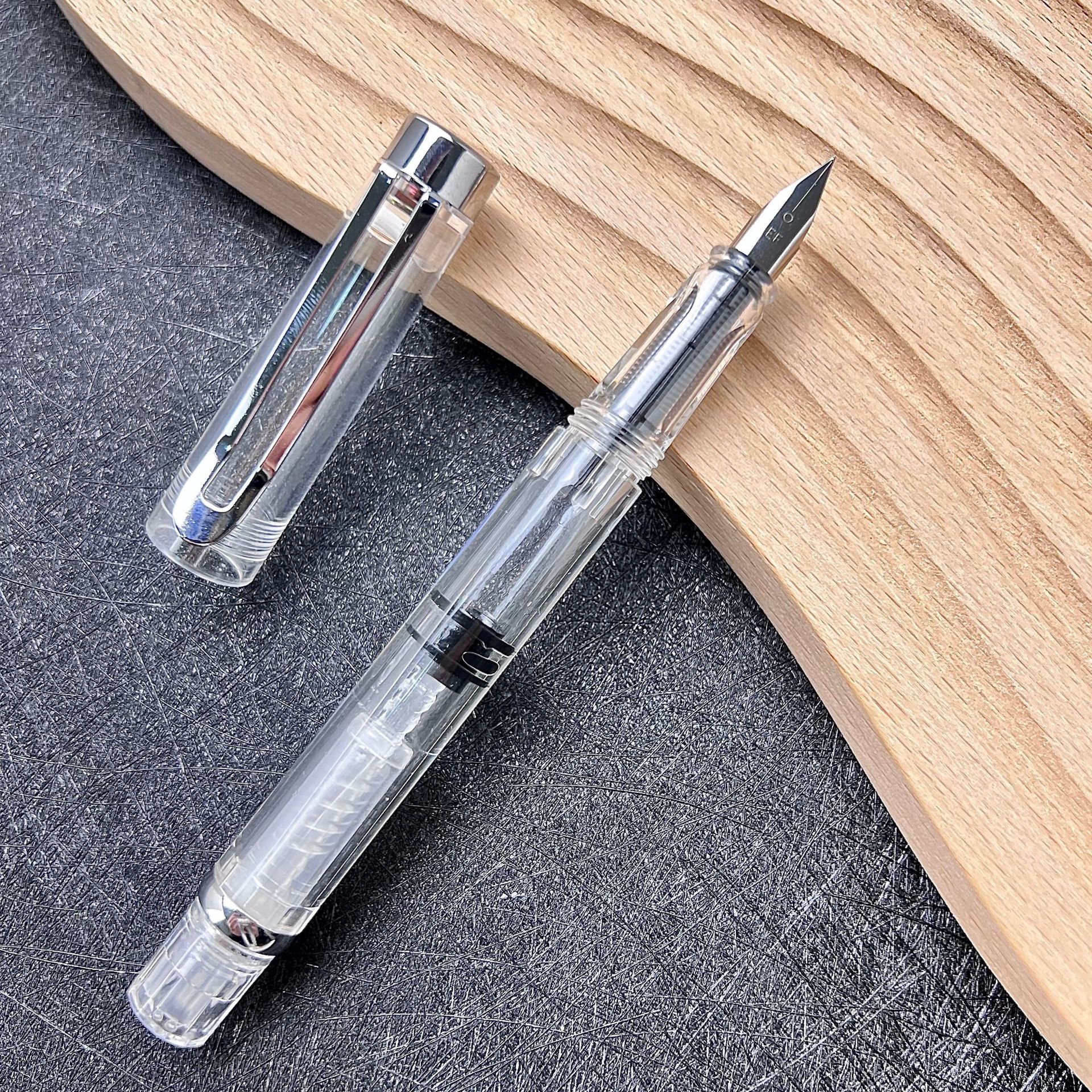 Ouguwen - Juego de regalo de papelería con bolígrafo de punta metálica giratoria de nuevo estilo, cartucho de tinta transparente que absorbe la tinta, para que los estudiantes practiquen la caligrafía.