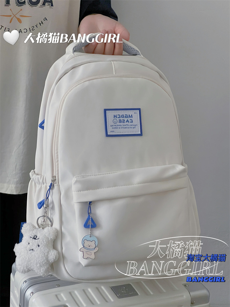 Mochila de los hombres simples ins mochila femenina de gran capacidad estudiante de la escuela secundaria estudiante de escuela secundaria mochila femenina al por mayor