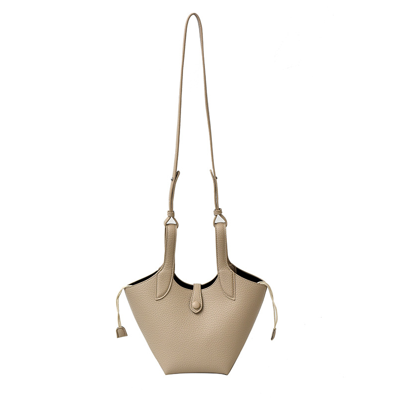 Bolsa de axila de textura de nicho Bolsa de mujer 2025 primavera nuevo bolso de cubo bolso de canasta de mensajero de un solo hombro simple