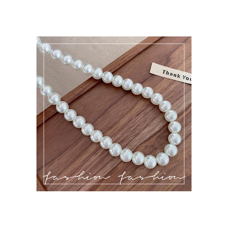 Collana lunga con perle di vetro stile francese elegante vintage_voghion.com