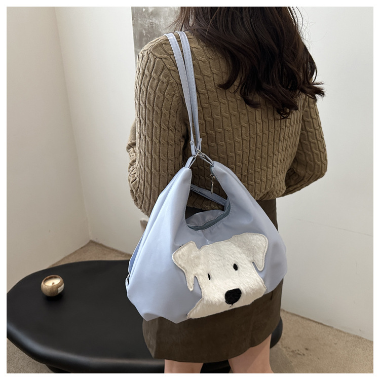 The new autumn and winter 2024 fashion cartoon backpack with simple, individual and niche design, single-shoulder bag and commuter tote bag undefined