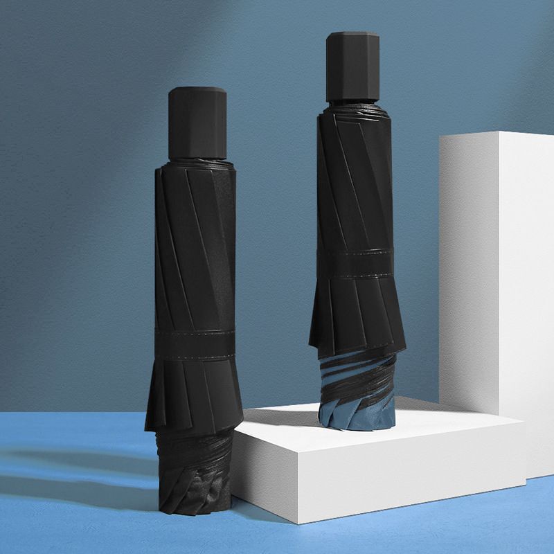 Manual large umbrella folding umbrella sunny and rainy dual-use student umbrella reinforced wind-resistant black glue UV-proof umbrella