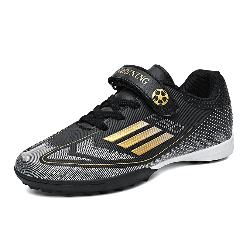 Nuevos niños transfronterizos niños y niñas transpirables cómodos deportes casuales zapatos de fútbol de clavos de césped estudiantes