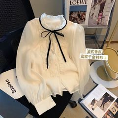 木の耳元の蝶結びのシフォンのシャツの女性2025夏と秋の新型のフランス式の設計感の柔らかい風の洋風のシャツの女性