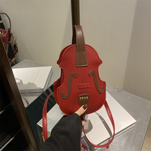 洋气个性造型20224新款风琴吉他欧美复古多功能手提单肩双肩包女