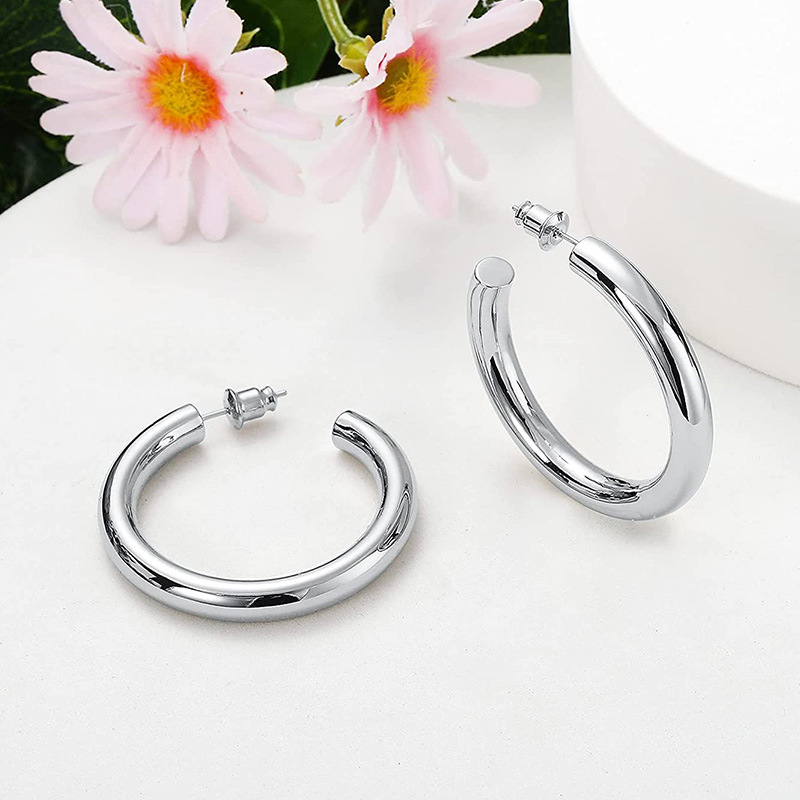 Orecchini a cerchio con zirconi multicolore e cristalli per donna_voghion.com