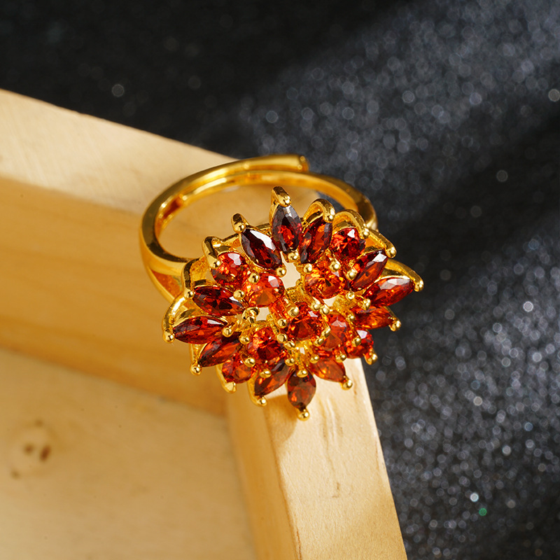 Nuevos productos lujosos ligeros ligeramente incrustados con anillo de sol amarillo super brillante anillo de sol de flores populares de nicho para mujeres