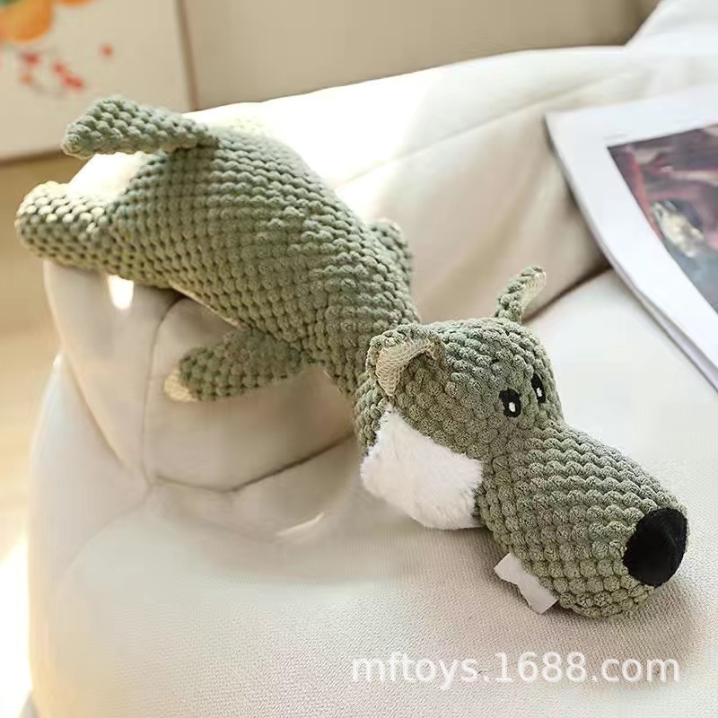 Nuevos suministros para mascotas perro de peluche de juguete molar resistente a la mordedura de pana tres animales muñeca de sonido pato amarillo al por mayor